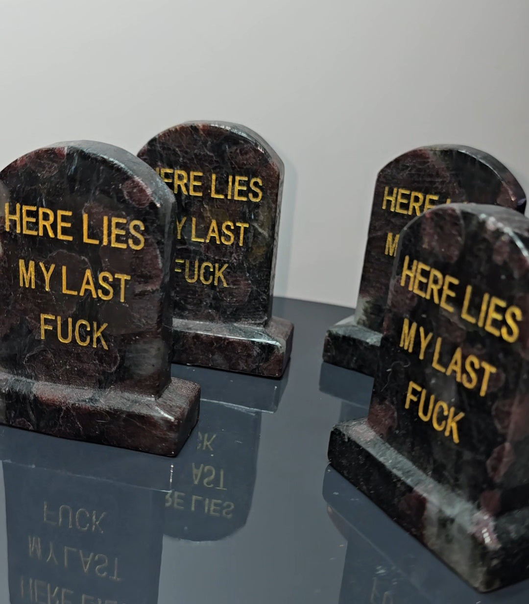 Crystal tombstones carving, here lies my last. / Funny saying