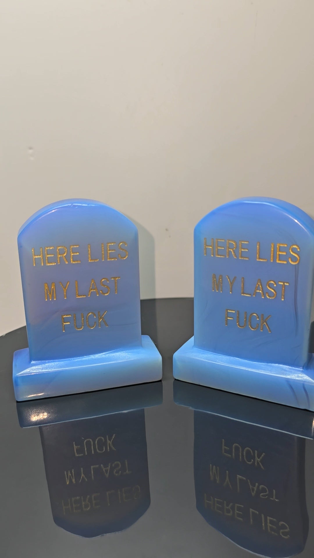 Crystal tombstones carving, here lies my last. / Funny saying