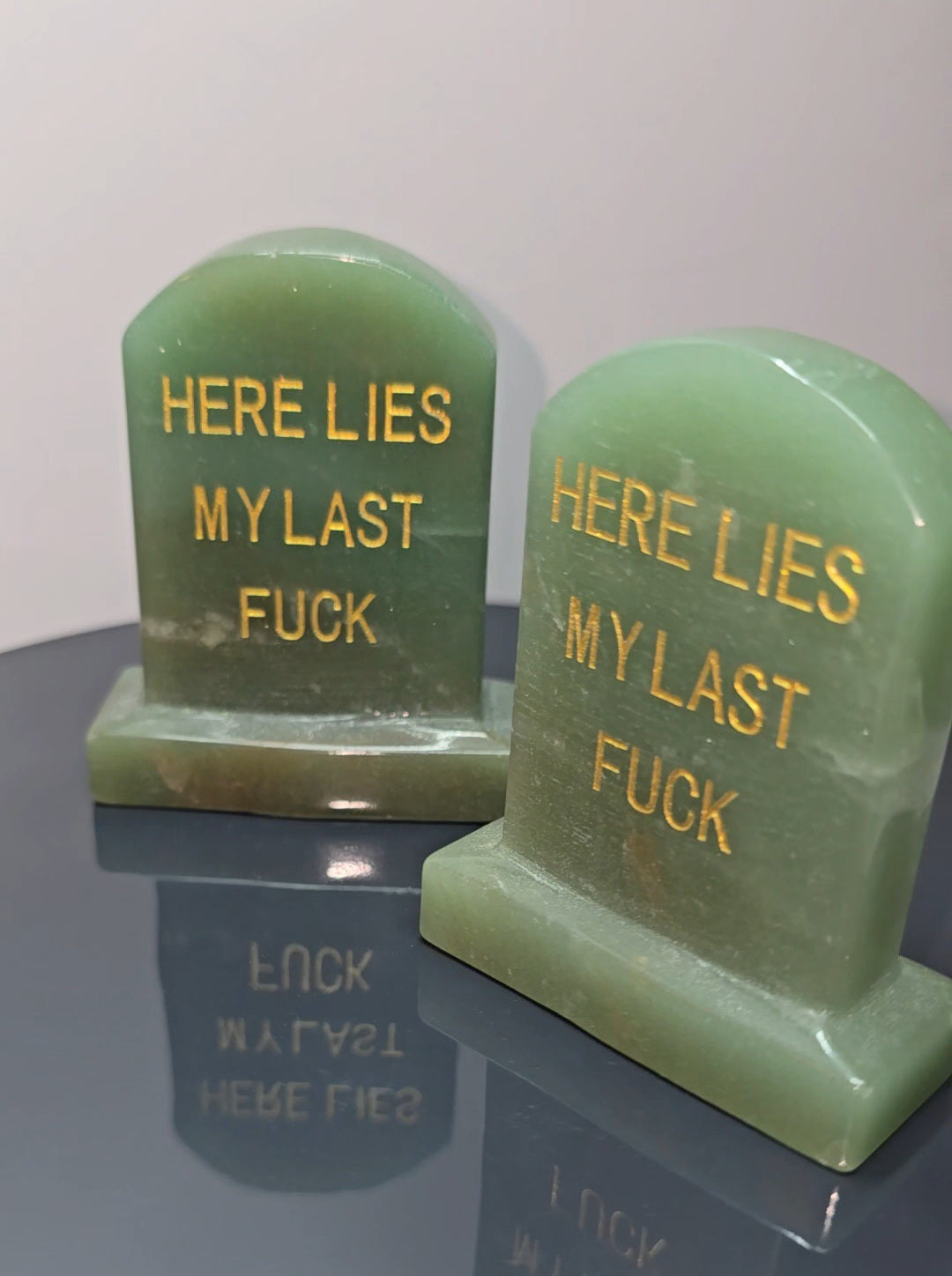 Crystal tombstones carving, here lies my last. / Funny saying