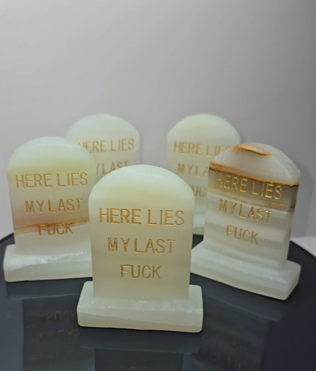 Crystal tombstones carving, here lies my last. / Funny saying