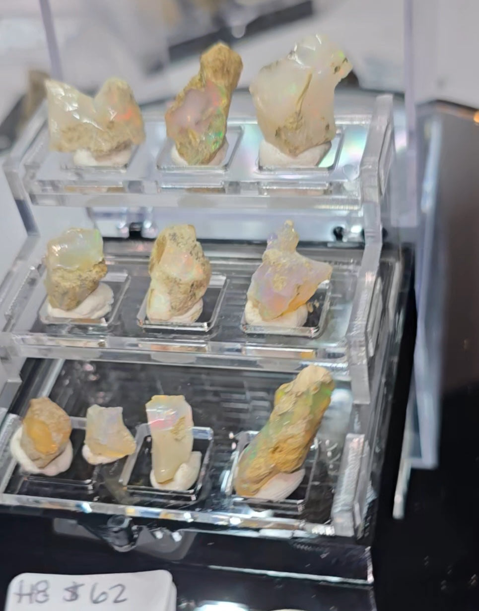 Raw Ethiopian Opals in 3 tiered display boxes
