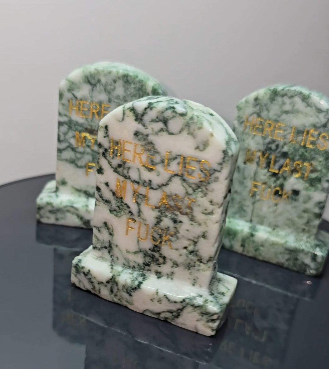 Crystal tombstones carving, here lies my last. / Funny saying