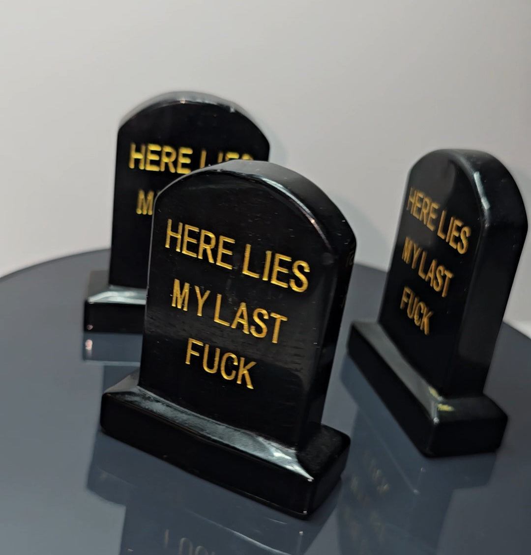 Crystal tombstones carving, here lies my last. / Funny saying