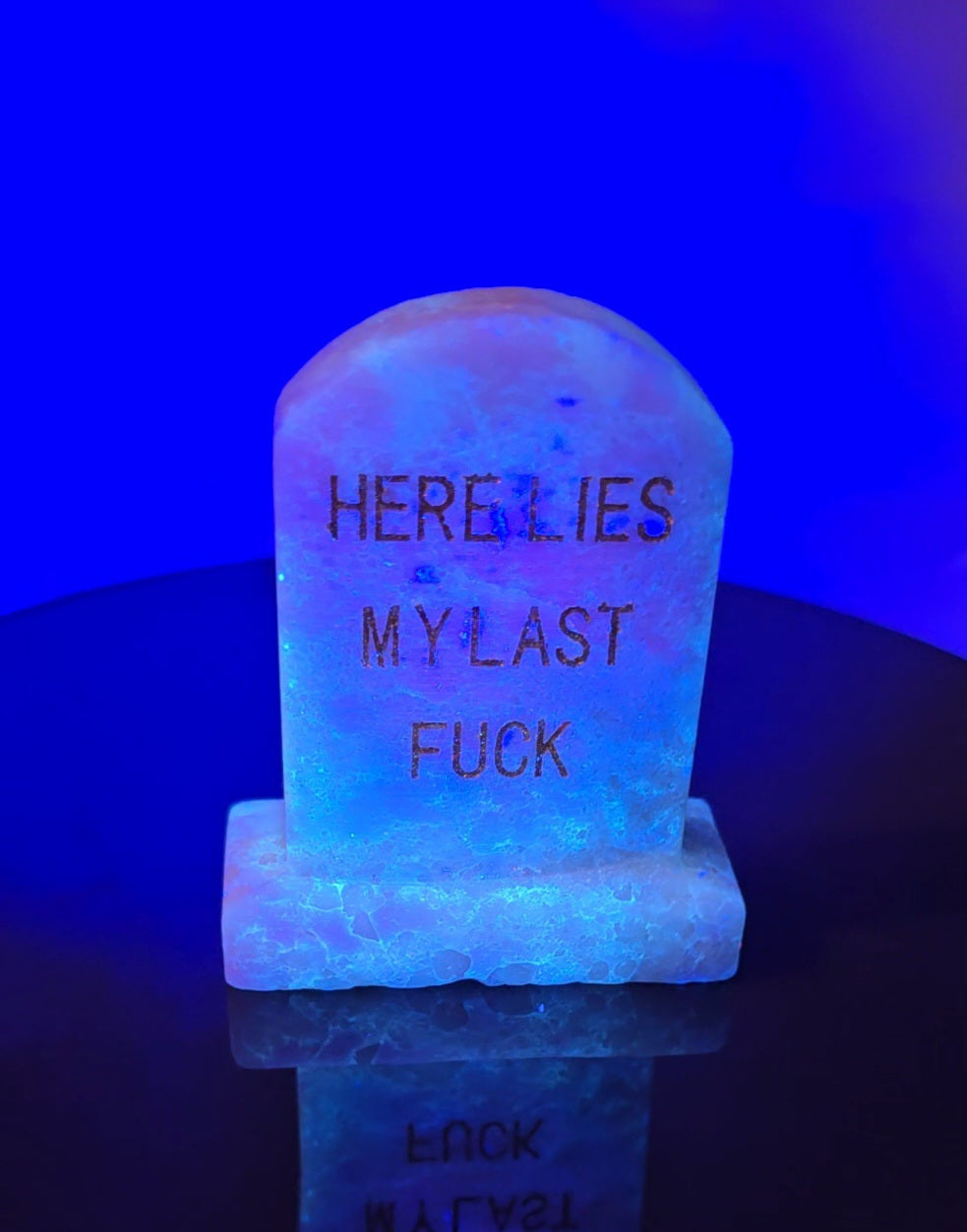 Crystal tombstones carving, here lies my last. / Funny saying