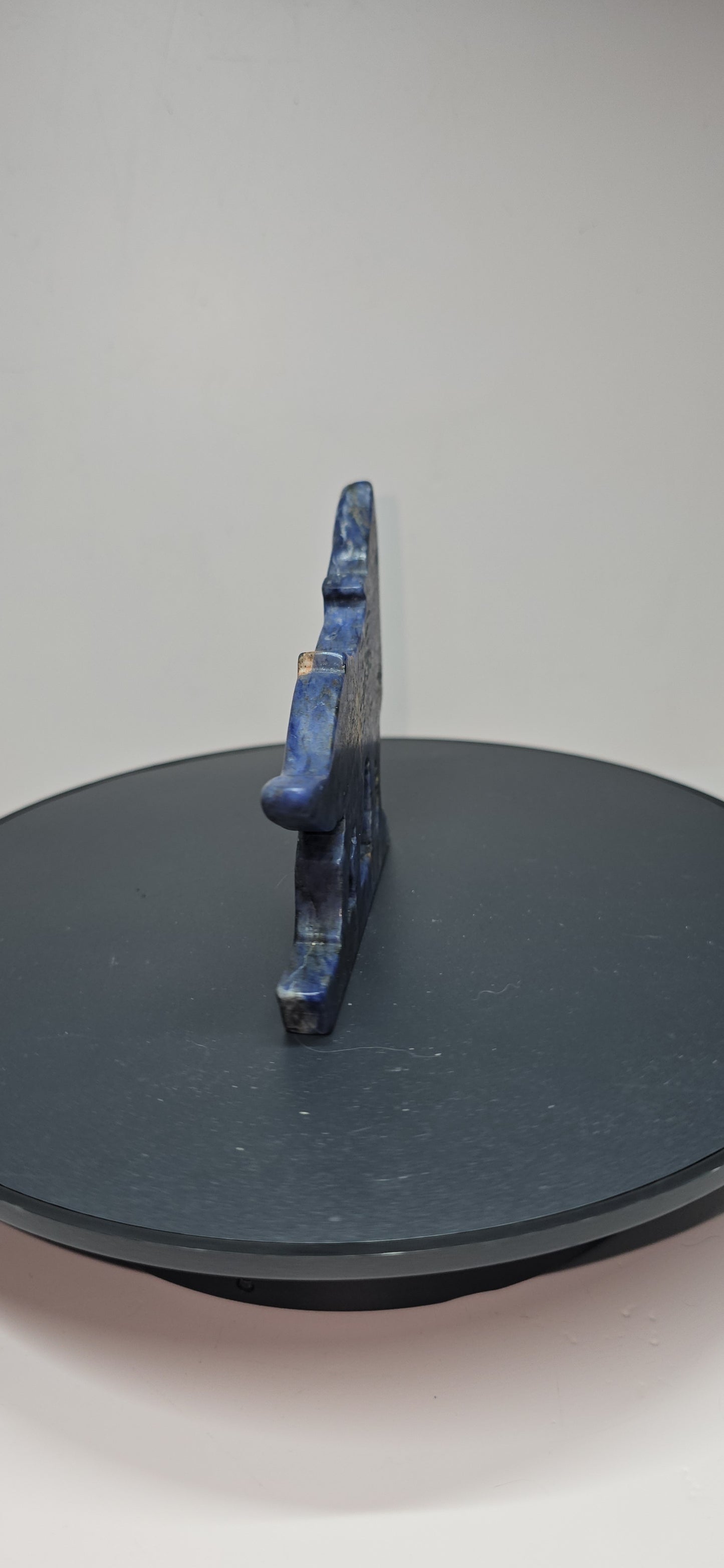Flat standing sodalite crystal howling wolf