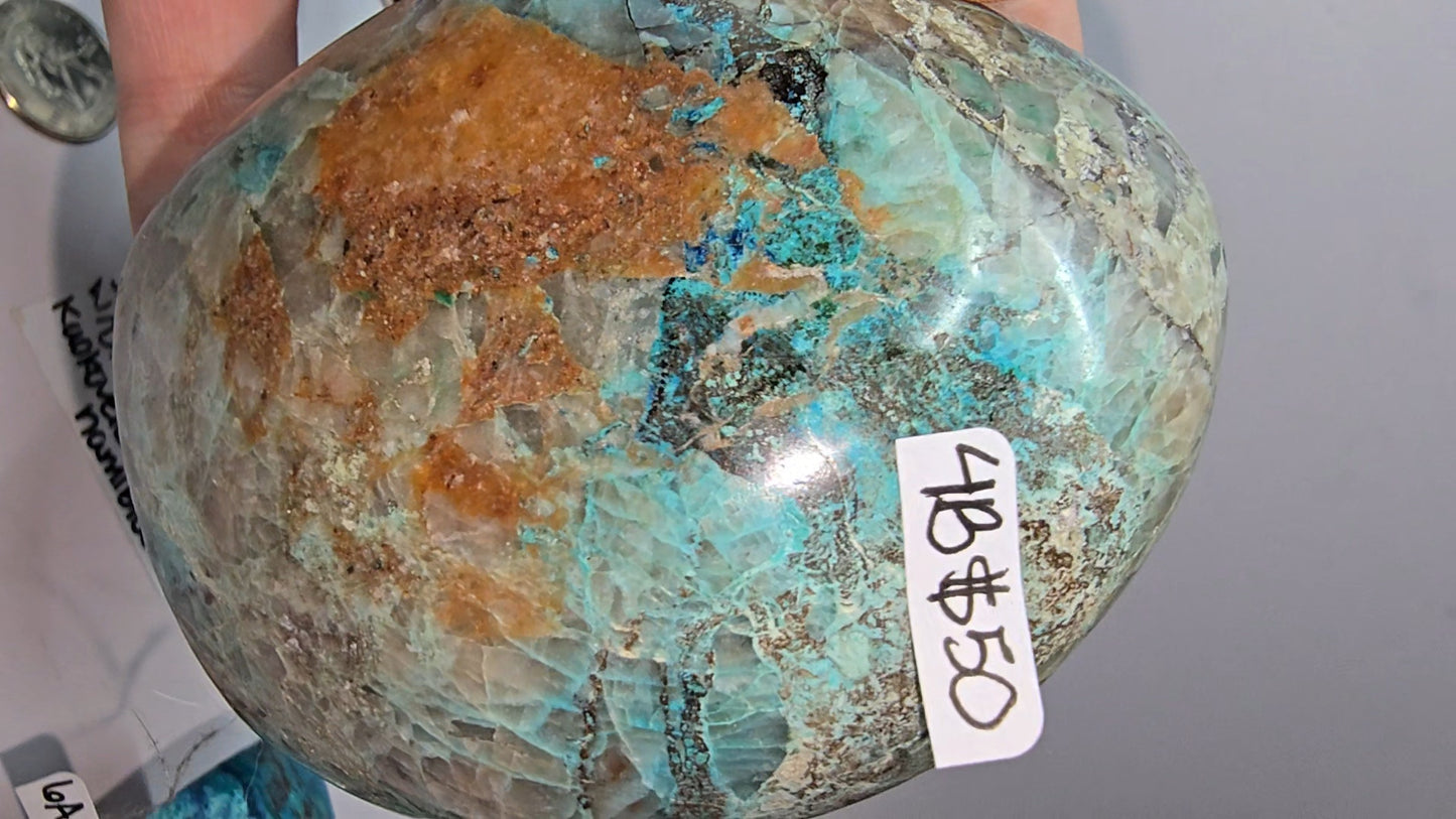Mix of polished shattuckite freeforms (some with dioptase) from Kaokoveld, Namibia