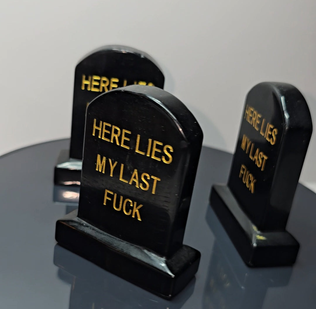 Crystal tombstones carving, here lies my last. / Funny saying