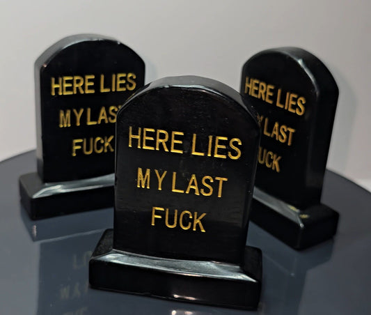 Crystal tombstones carving, here lies my last. / Funny saying