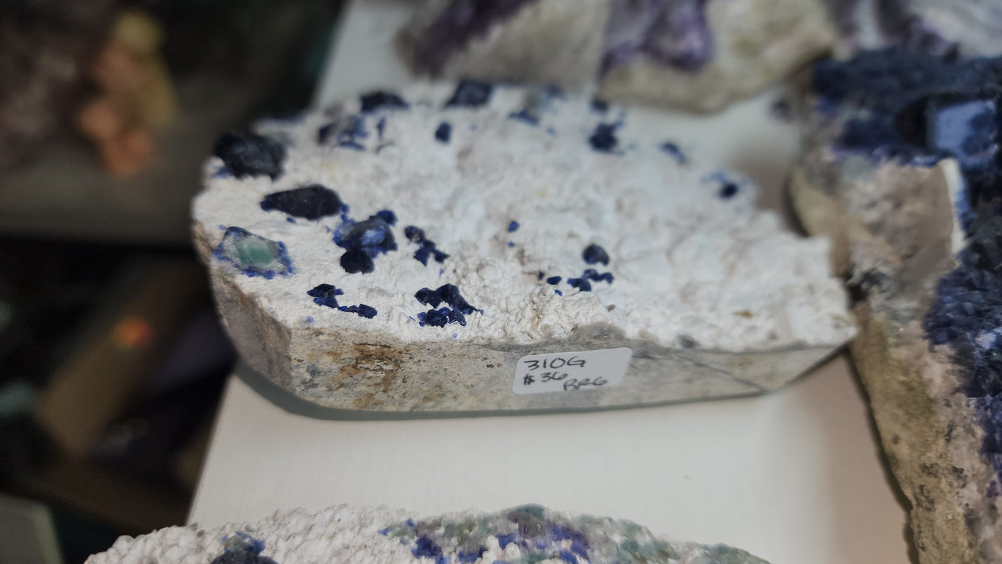 Colorful "blueberry" like Fluorite on quartz