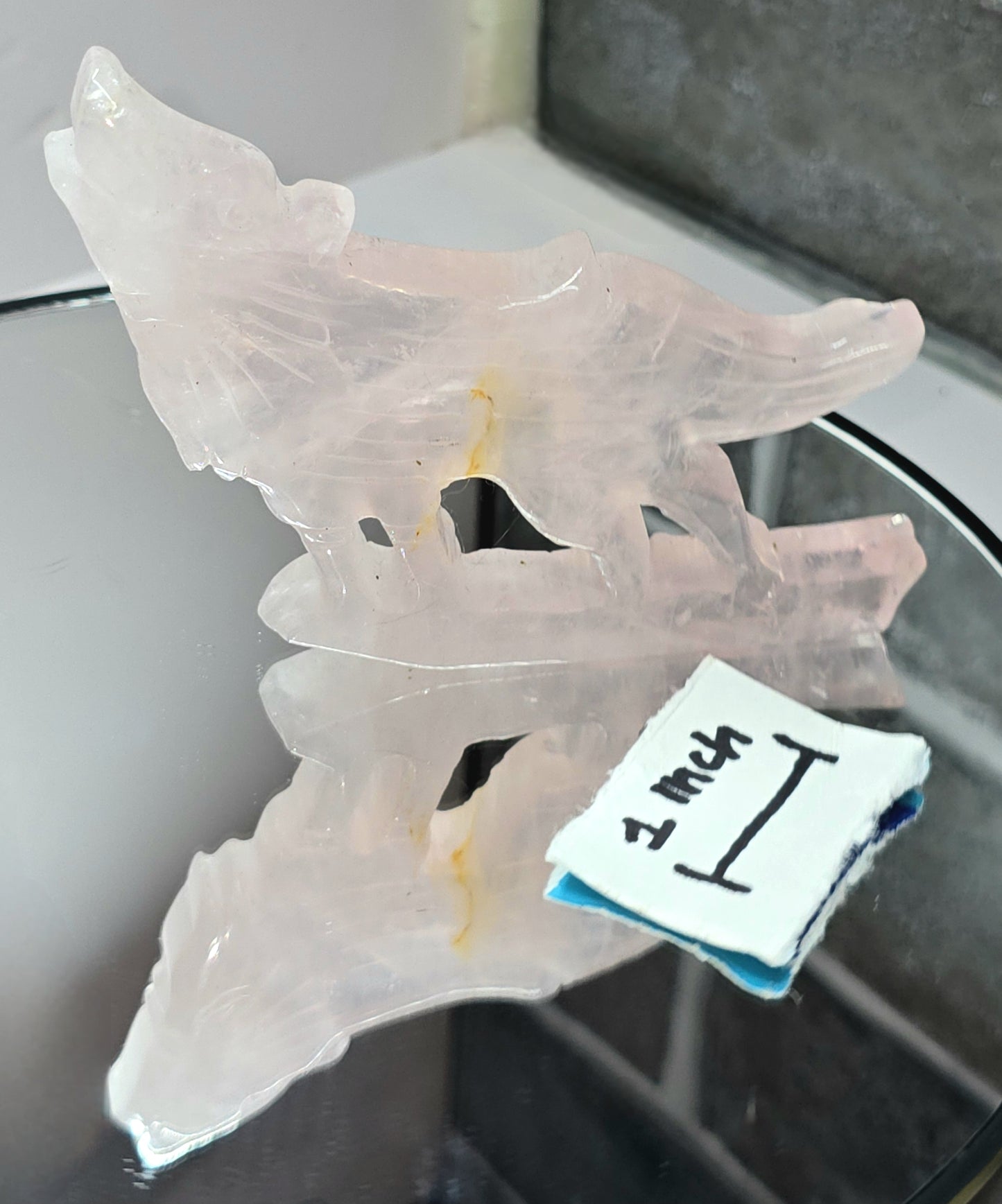 Flat standing rose quartz crystal howling wolf